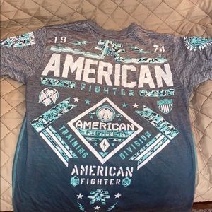 We are selling a men’s American fighter t shirt